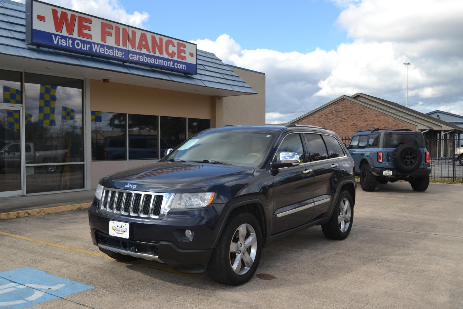 2013 Mineral Gray Metallic /Black Leather Interior Jeep Grand Cherokee Overland 4WD (1C4RJFCT1DC) with an 5.7L V8 OHV 16V engine, 5-Speed Automatic transmission, located at 1355 North 11th Street, Beaumont, 77702, (409) 832-0006, 30.094290, -94.130096 - Photo #0